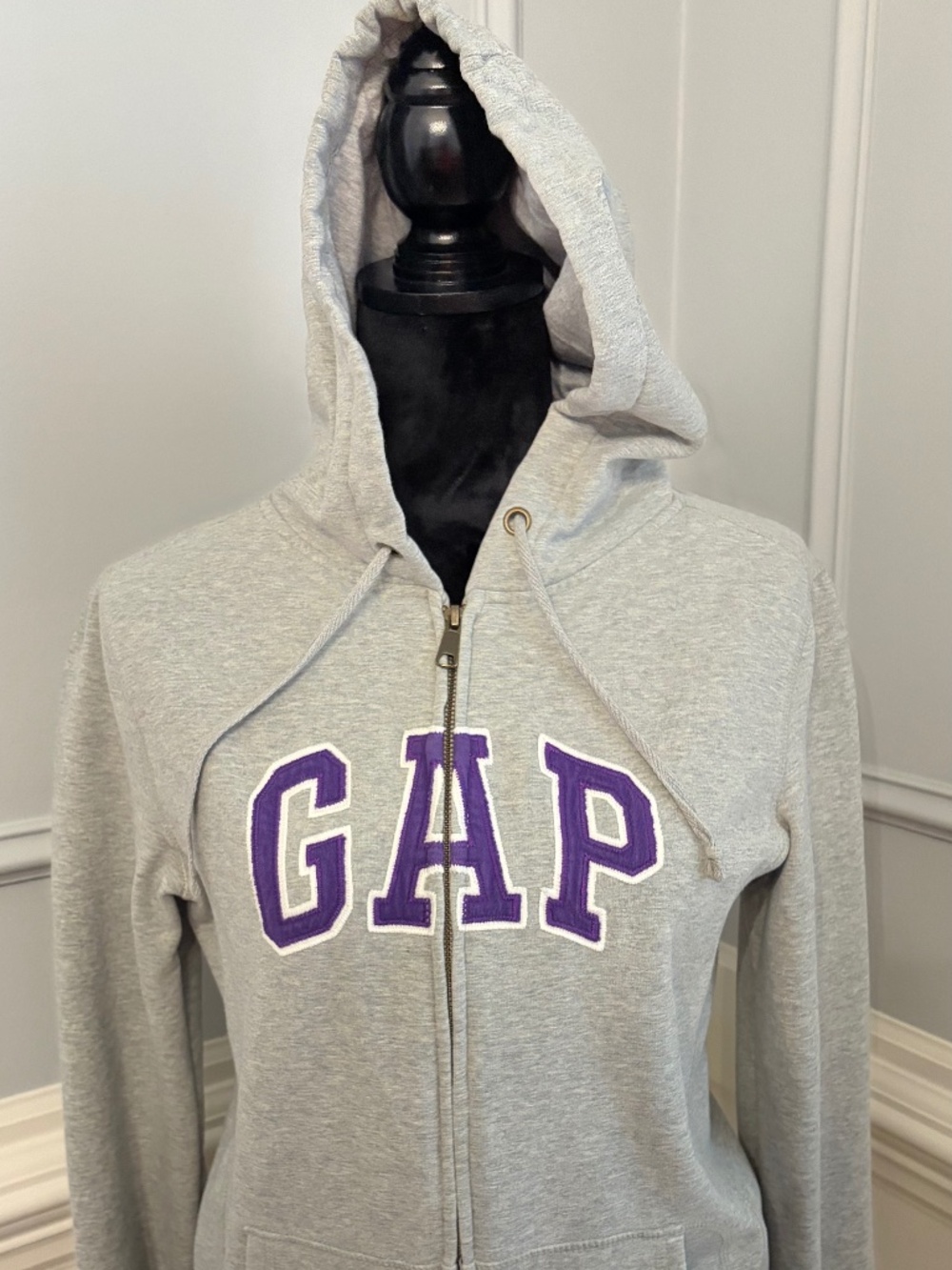 Gap hooded sweatshirt size medium; color gray with purple letters